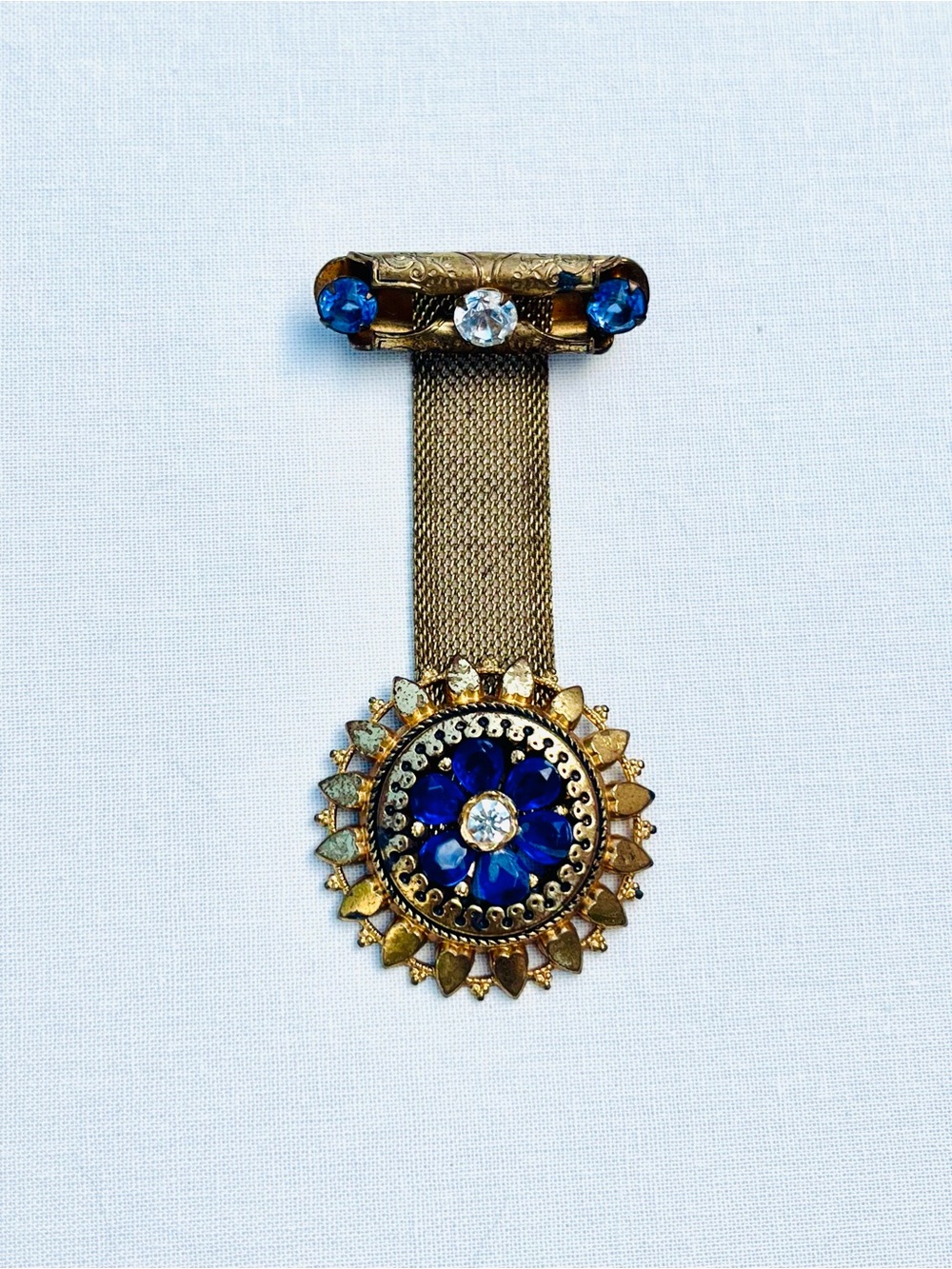 Gold-Tone Blue Crystal Sunburst Brooch Pendant